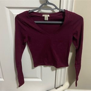 Dark maroon red top with open neckline size small never been worn